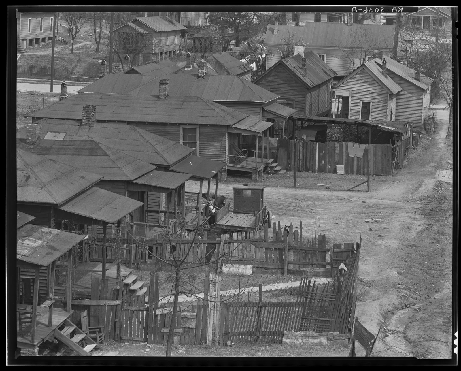 Backyards, rooftops and a drainage ditch. Walker Evans, Atlanta, Georgia (1936)